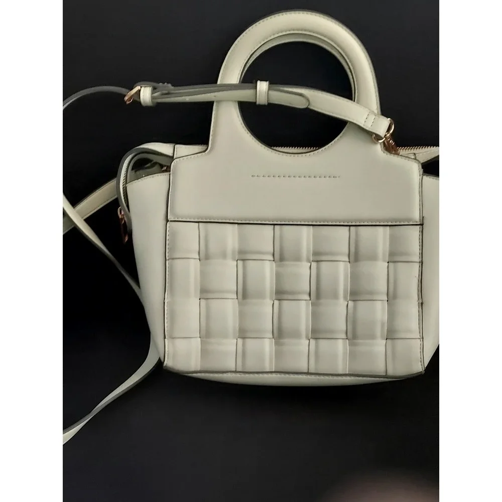 Fresh Spring Crossbody Handbag Color is‎ a very light green basket weave front